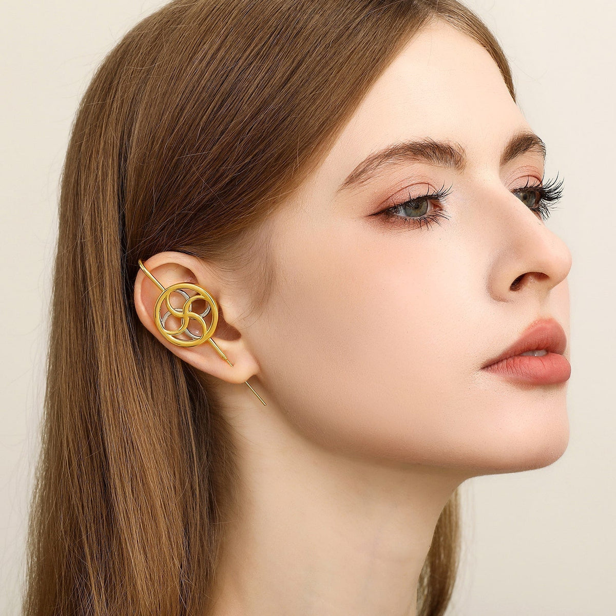 Kinetic Loop ear cuff worn on the ear, profile view