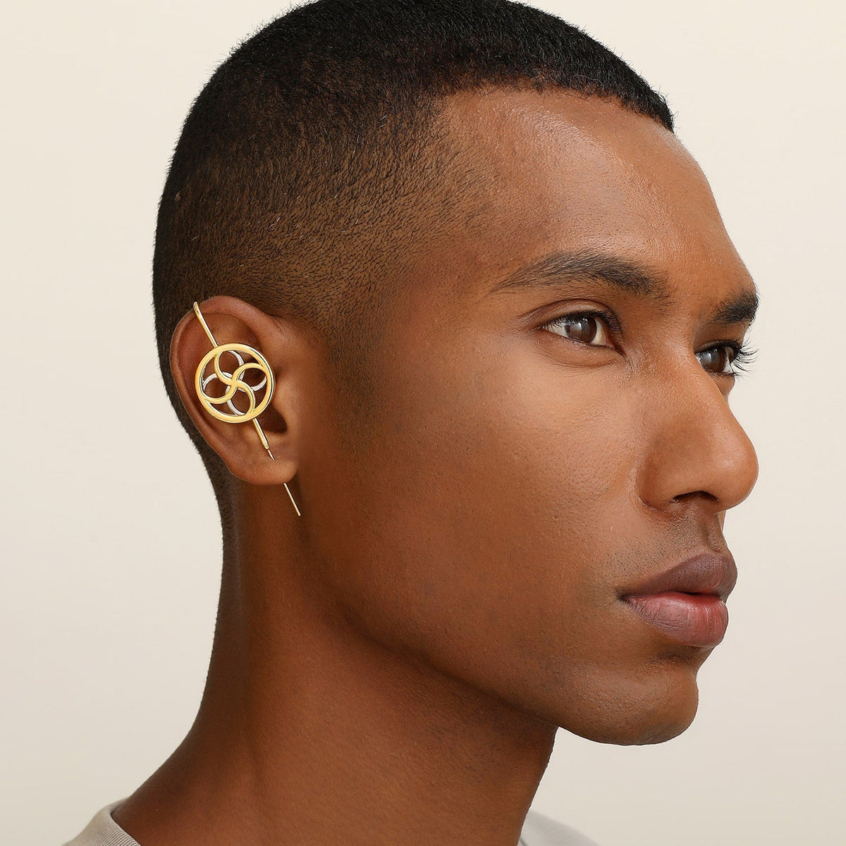 Kinetic Loop ear cuff worn on the ear, profile view