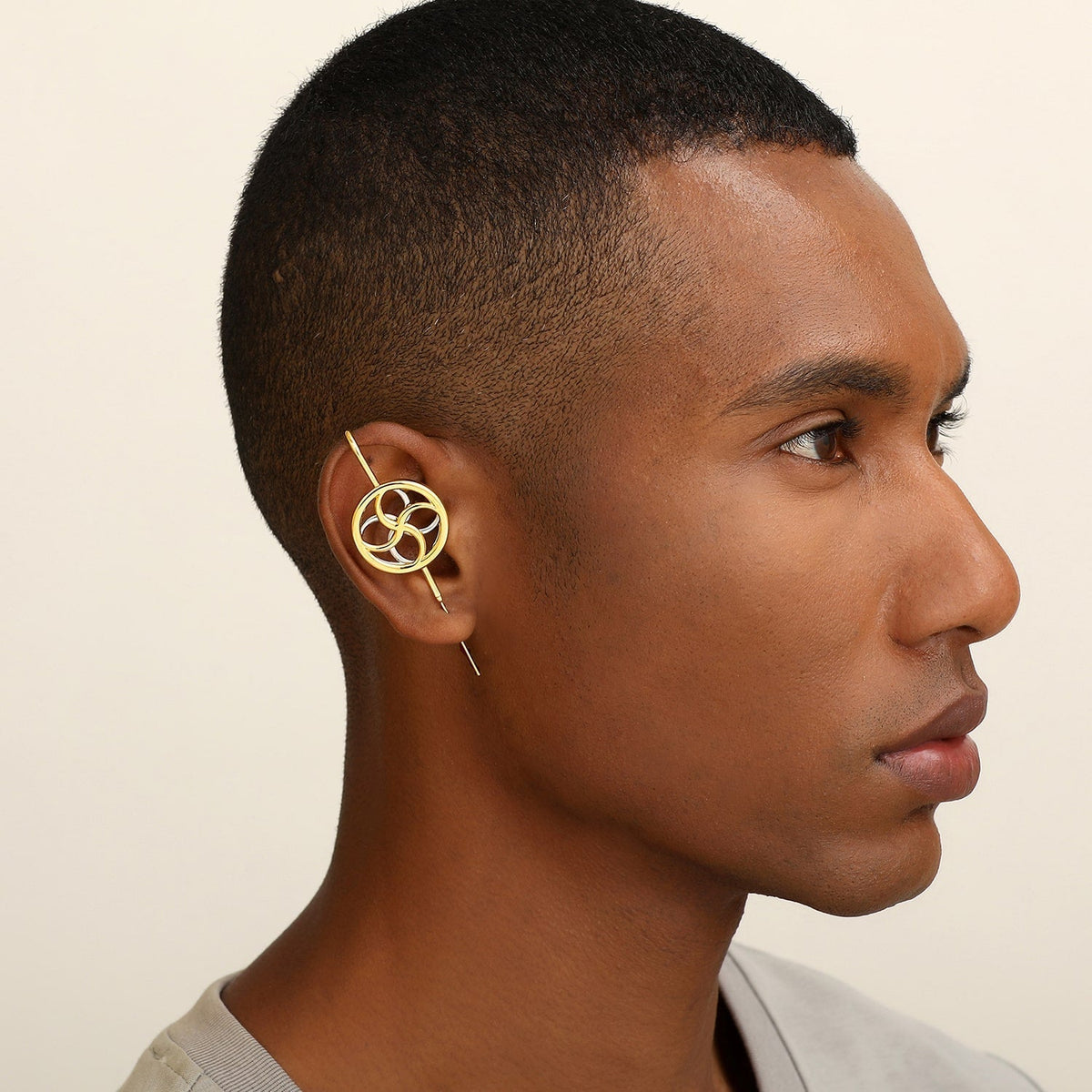 Kinetic Loop ear cuff worn on the ear, profile view