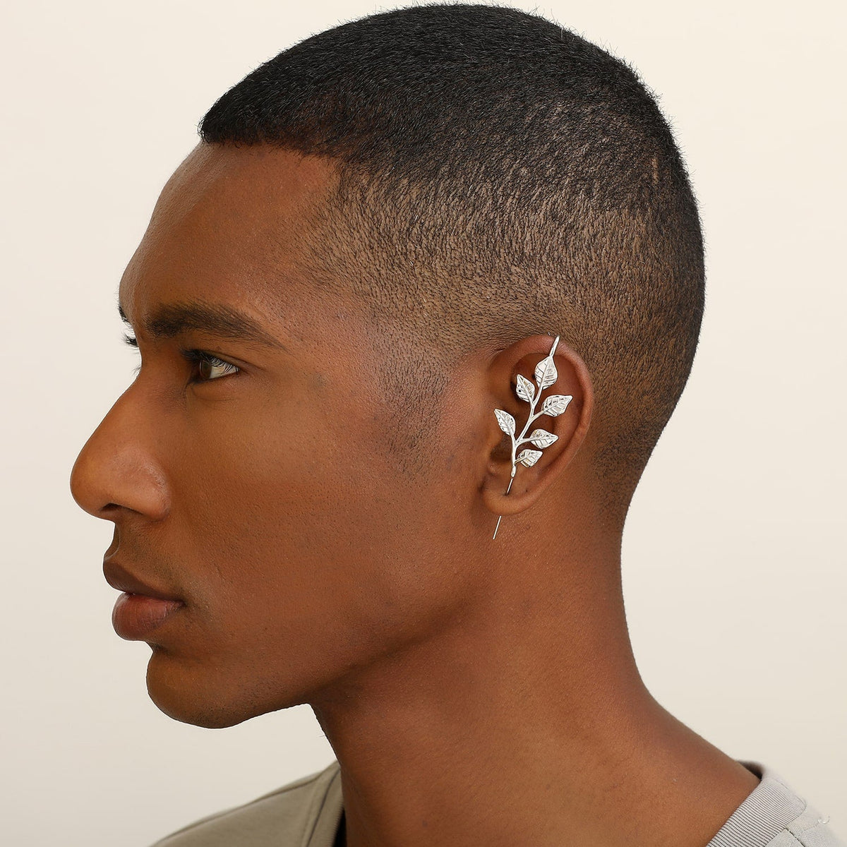 Whispering Leaves ear cuff worn on the ear, profile view