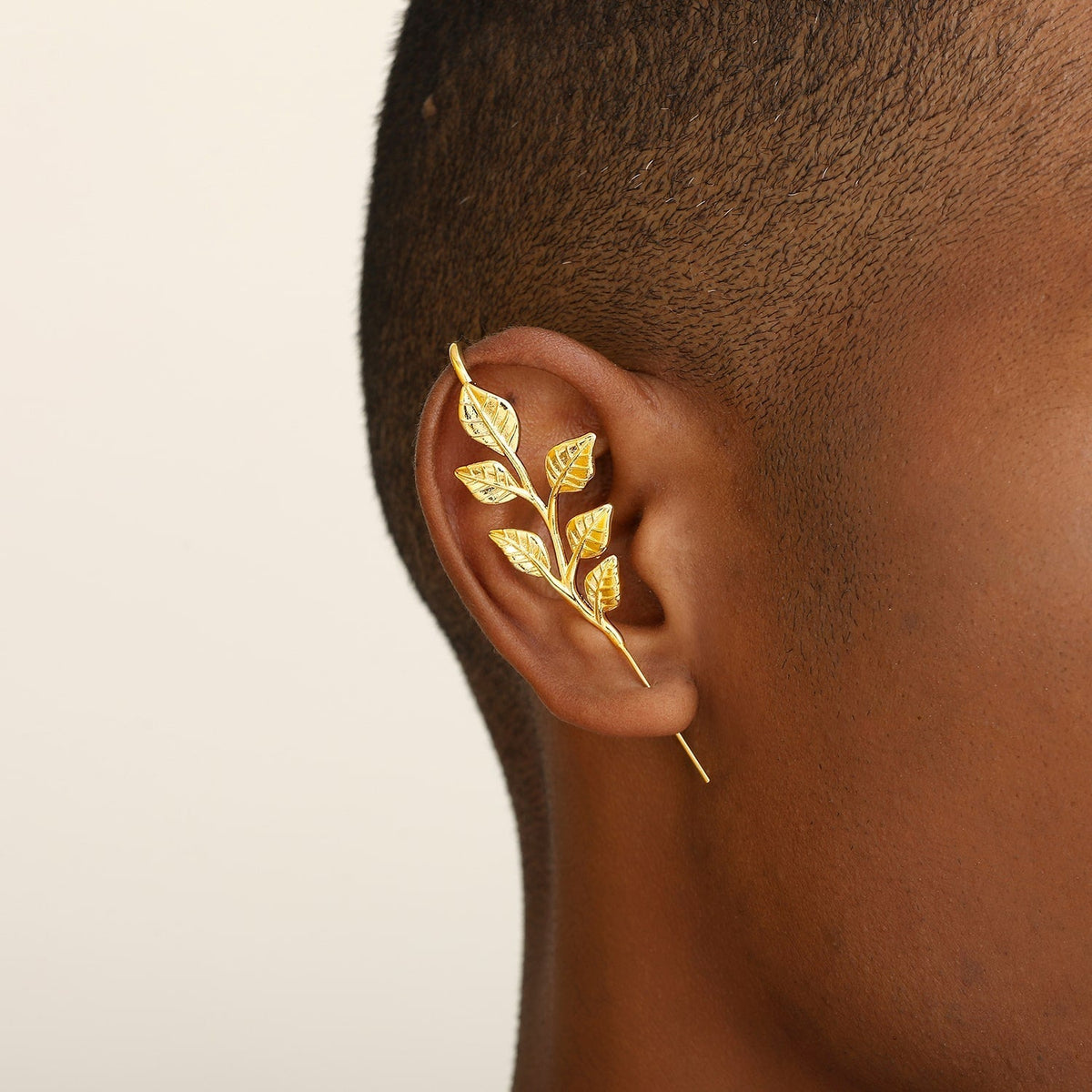 Whispering Leaves ear cuff worn on the ear, profile view