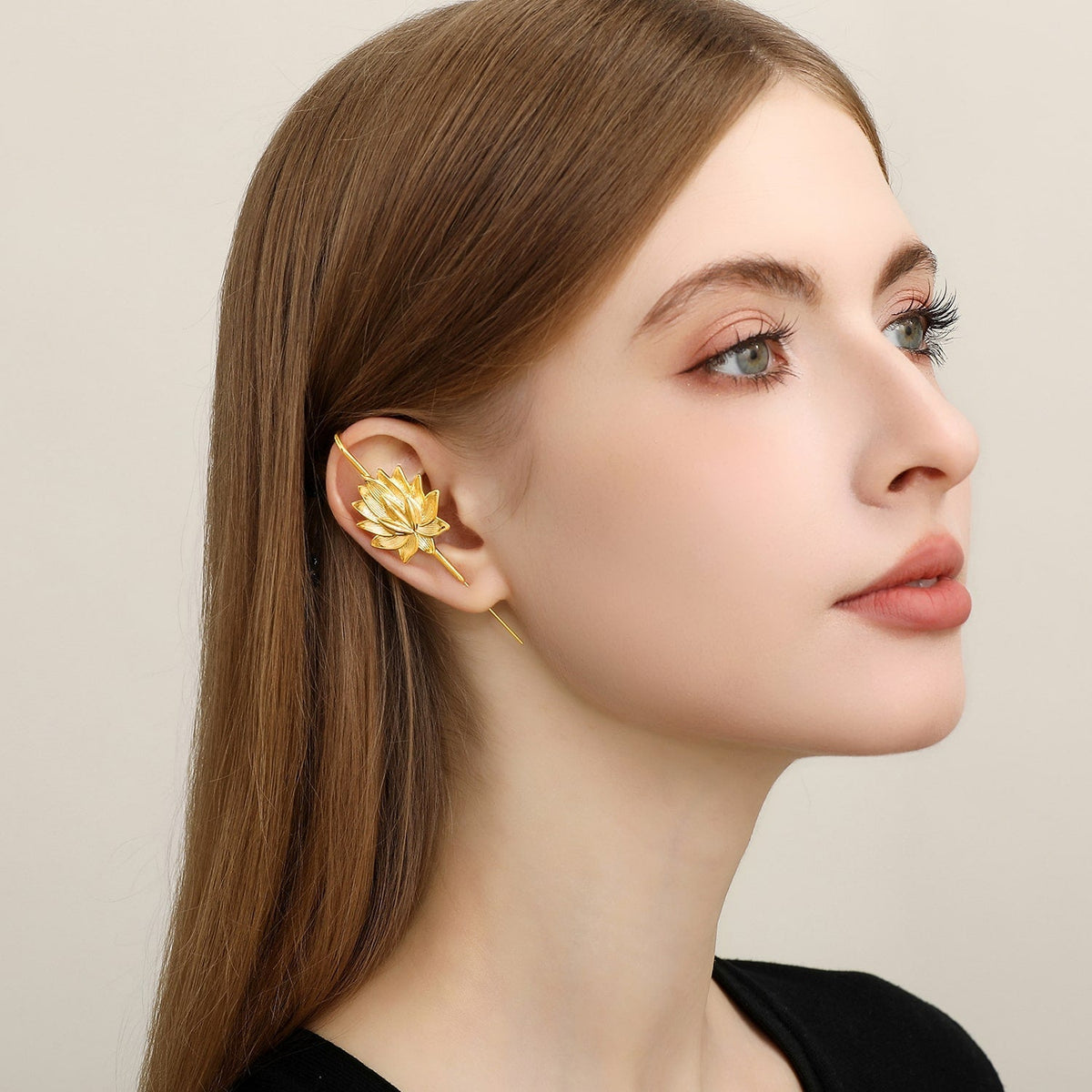 Lotus Bloom ear cuff worn on the ear, profile view