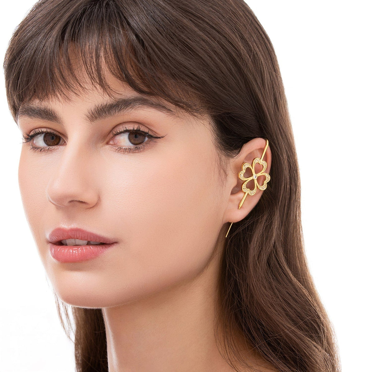 Lucky Clover ear cuff worn on the ear, profile view