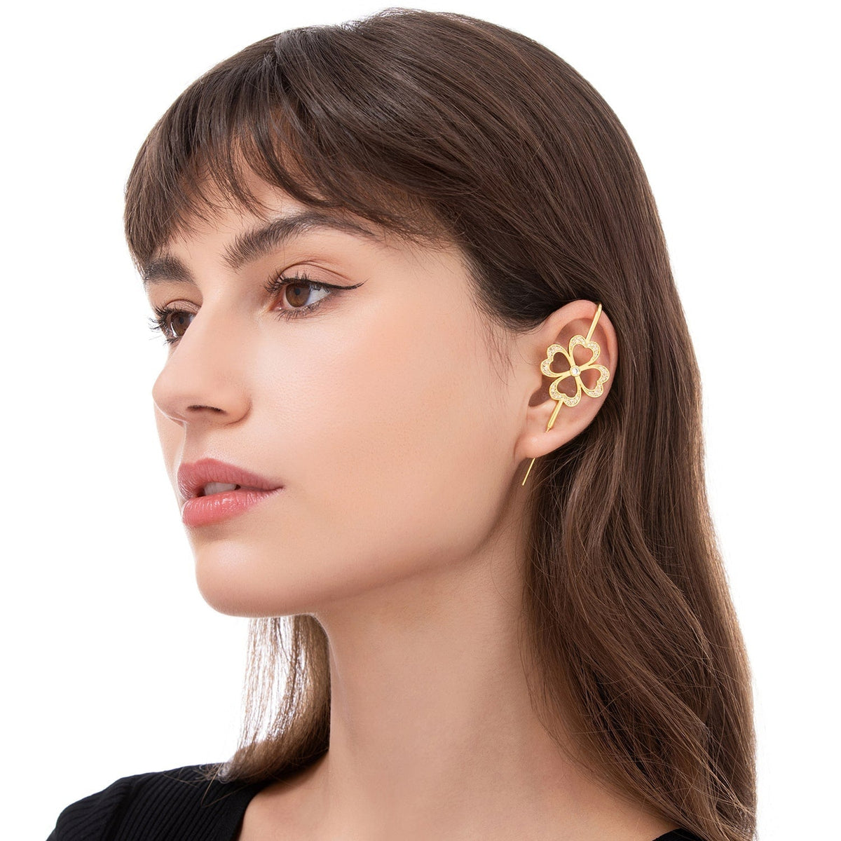 Lucky Clover ear cuff worn on the ear, profile view