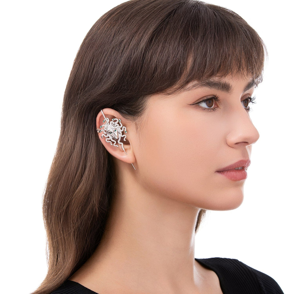 Medusa's Gaze ear cuff worn on the ear, profile view