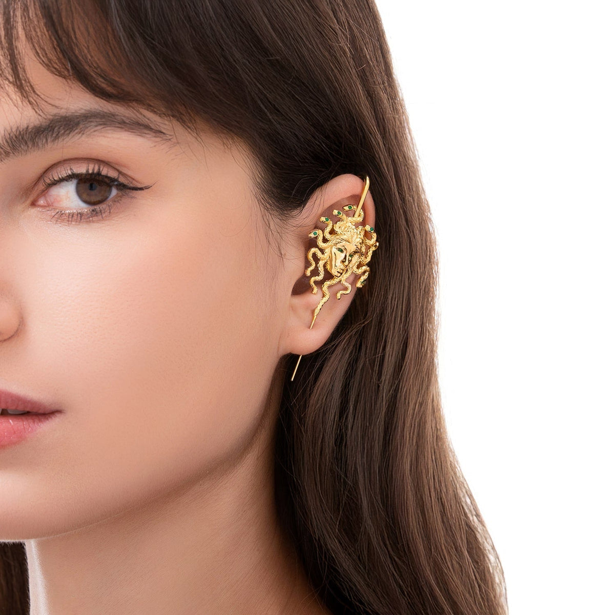 Medusa's Gaze ear cuff worn on the ear, profile view