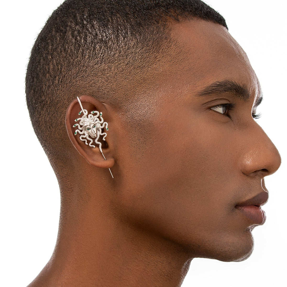 Medusa's Gaze ear cuff worn on the ear, profile view