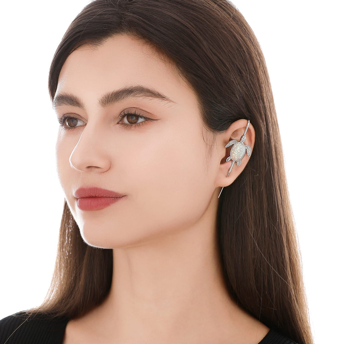 Ocean Guardian ear cuff worn on the ear, profile view