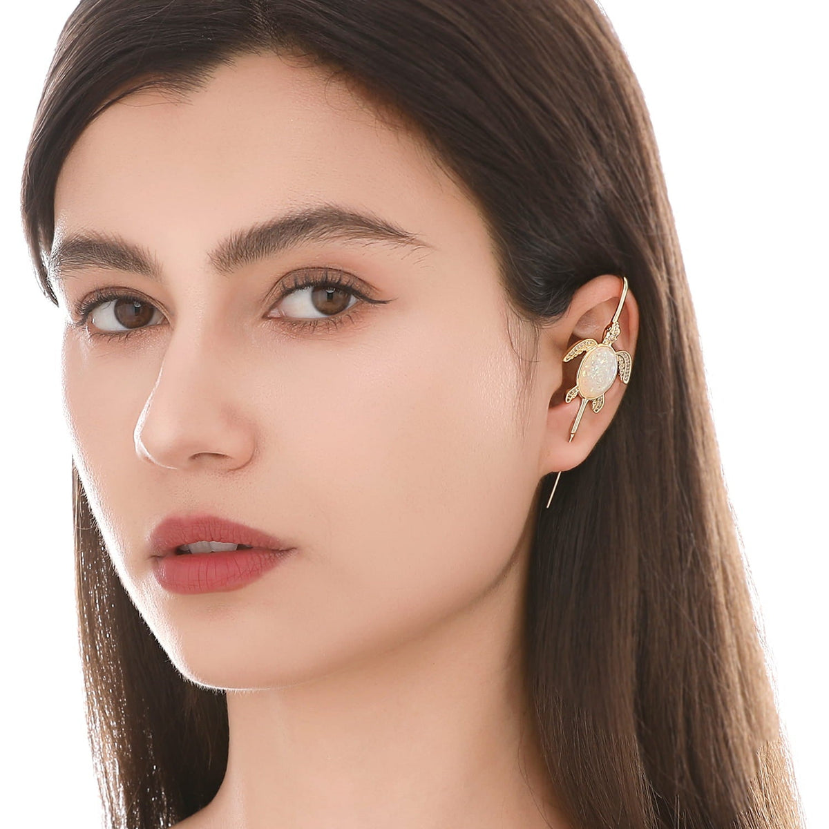 Ocean Guardian ear cuff worn on the ear, profile view