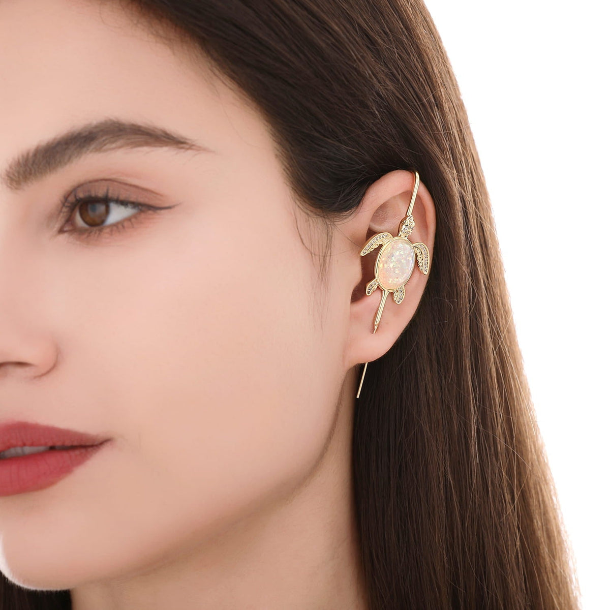 Ocean Guardian ear cuff worn on the ear, profile view