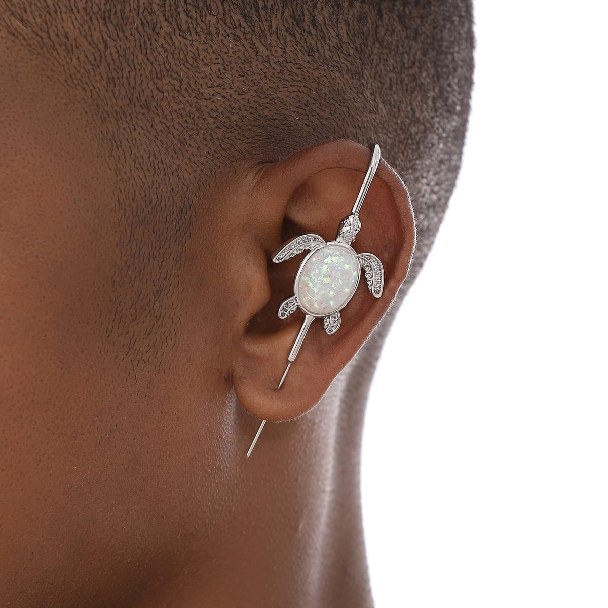 Ocean Guardian ear cuff worn on the ear, profile view