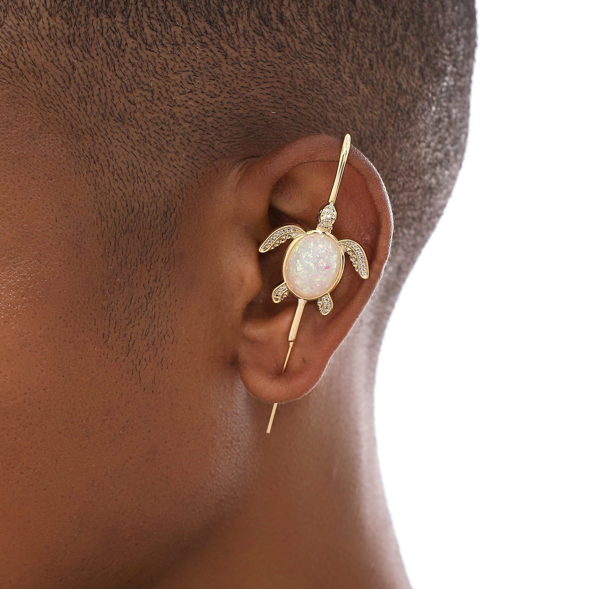 Ocean Guardian ear cuff worn on the ear, profile view