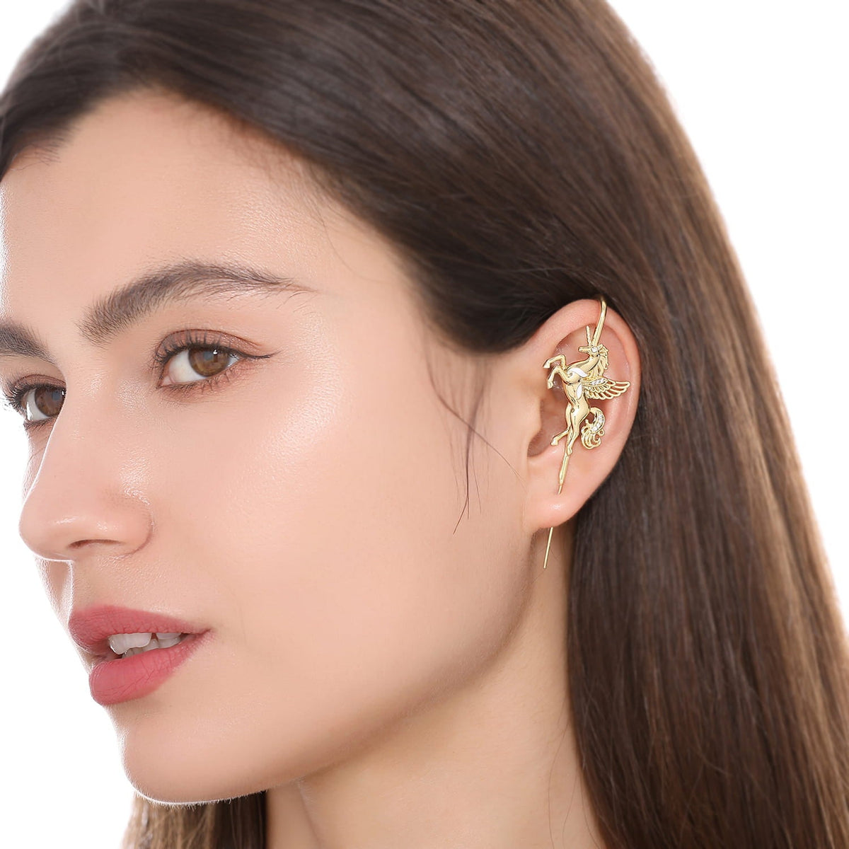 Pegacorn ear cuff worn on the ear, profile view