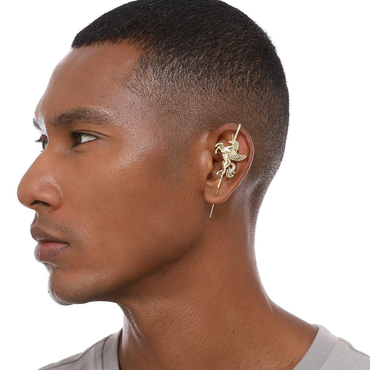 Pegacorn ear cuff worn on the ear, profile view