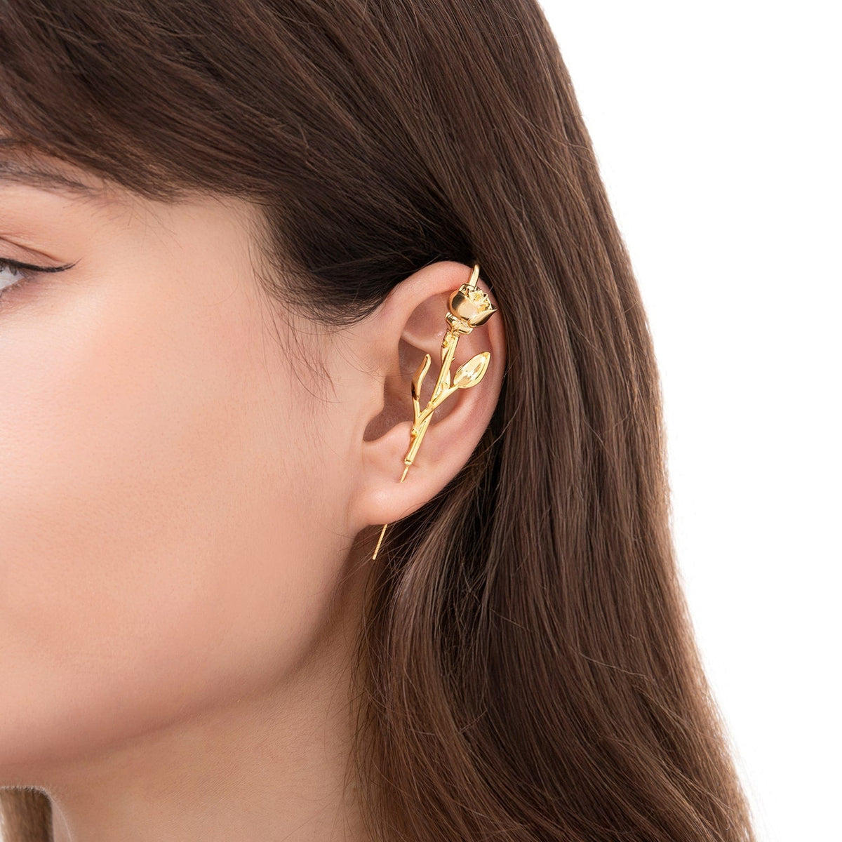 Radiant Rose ear cuff worn on the ear, profile view