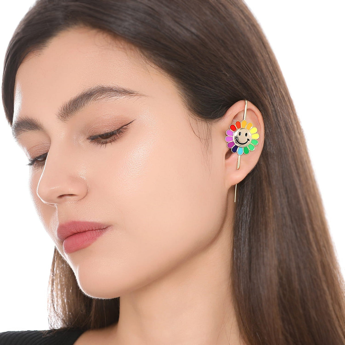 Rainbow Flower ear cuff worn on the ear, profile view