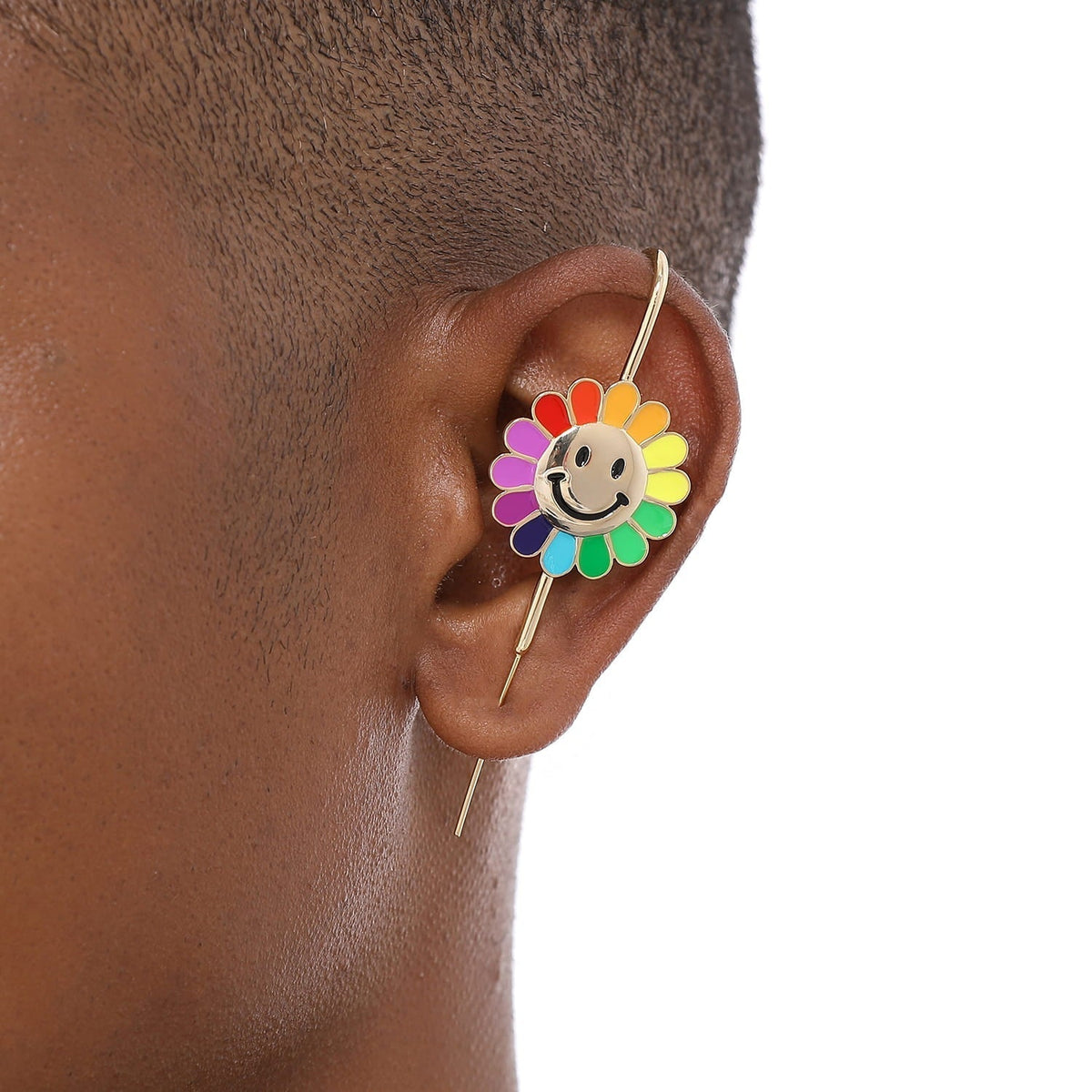 Rainbow Flower ear cuff worn on the ear, profile view
