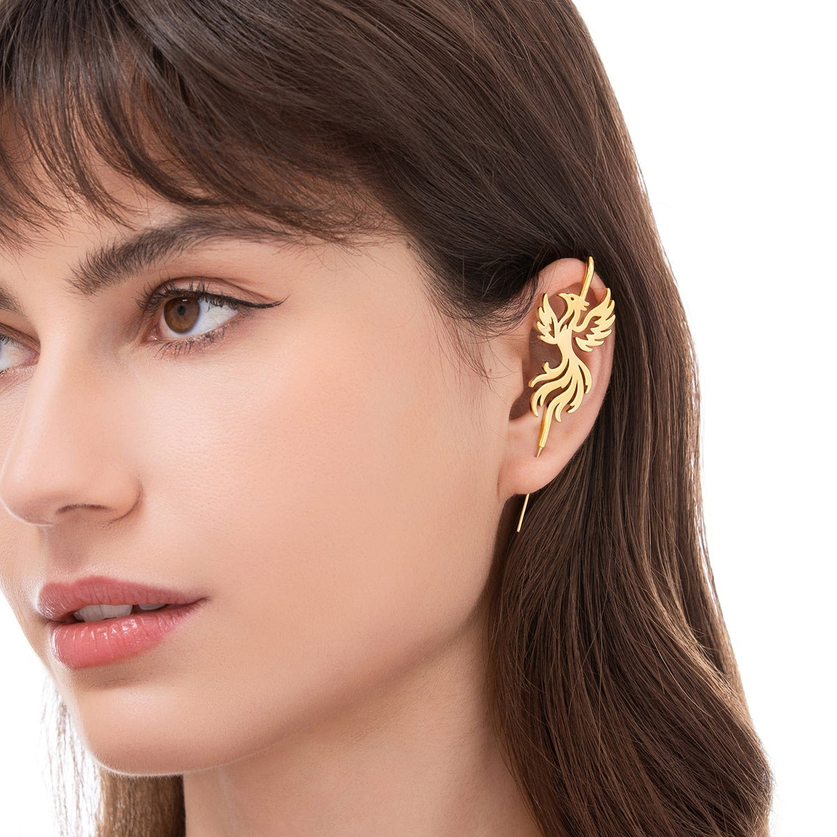 Rising Phoenix ear cuff worn on the ear, profile view