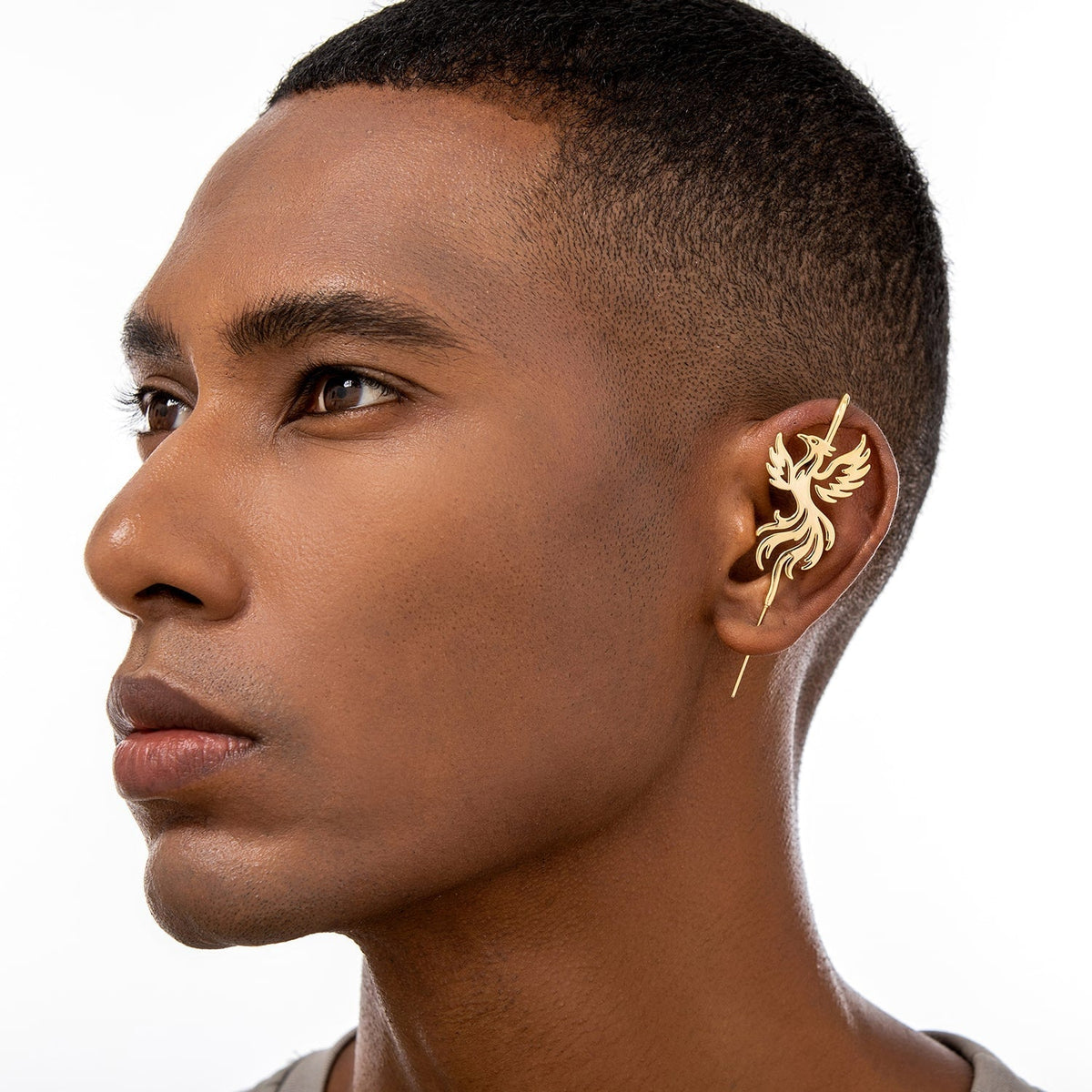 Rising Phoenix ear cuff worn on the ear, profile view