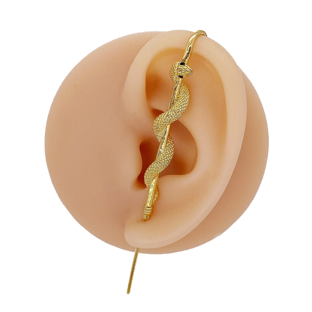 Coiled Snake ear cuff in gold on a black ear form