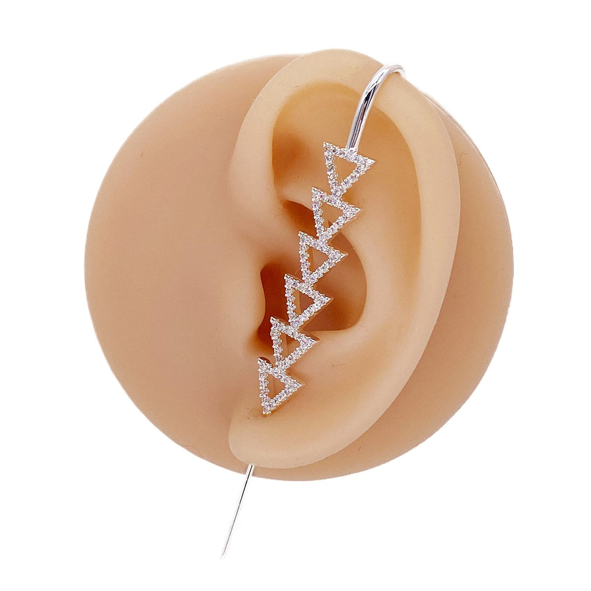 Triangle ear cuff in silver on a black ear form
