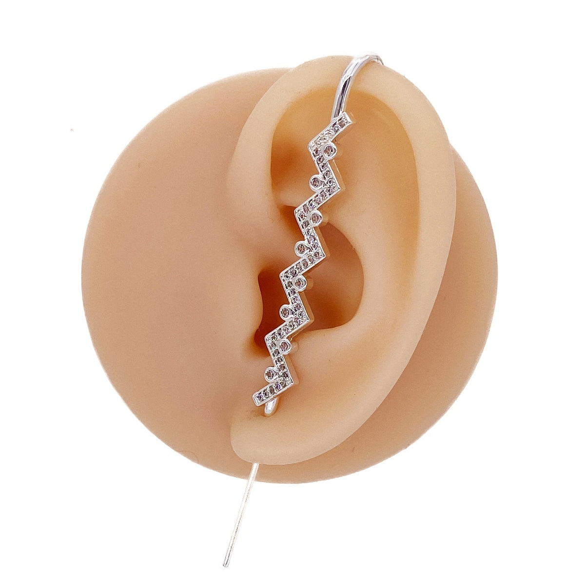 Traces ear cuff in silver on a black ear form