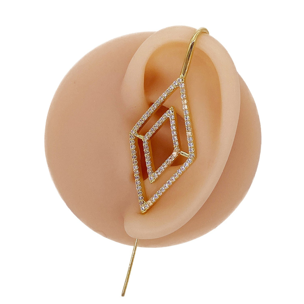 Diamond ear cuff in gold on a black ear form