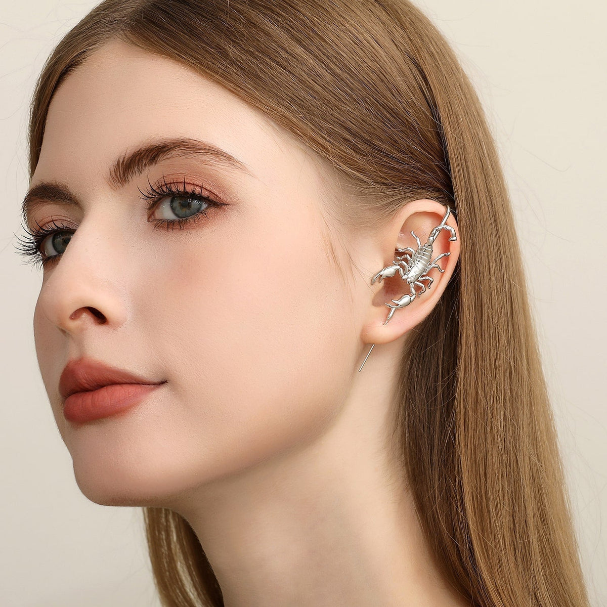 Fierce Scorpion ear cuff worn on the ear, profile view