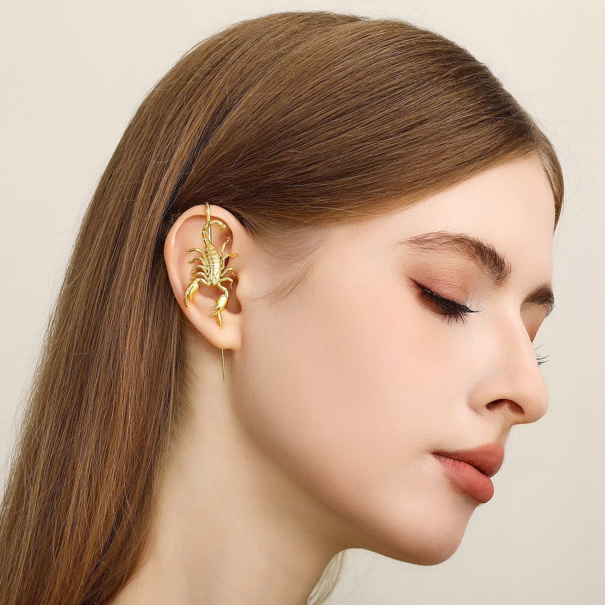 Fierce Scorpion ear cuff worn on the ear, profile view