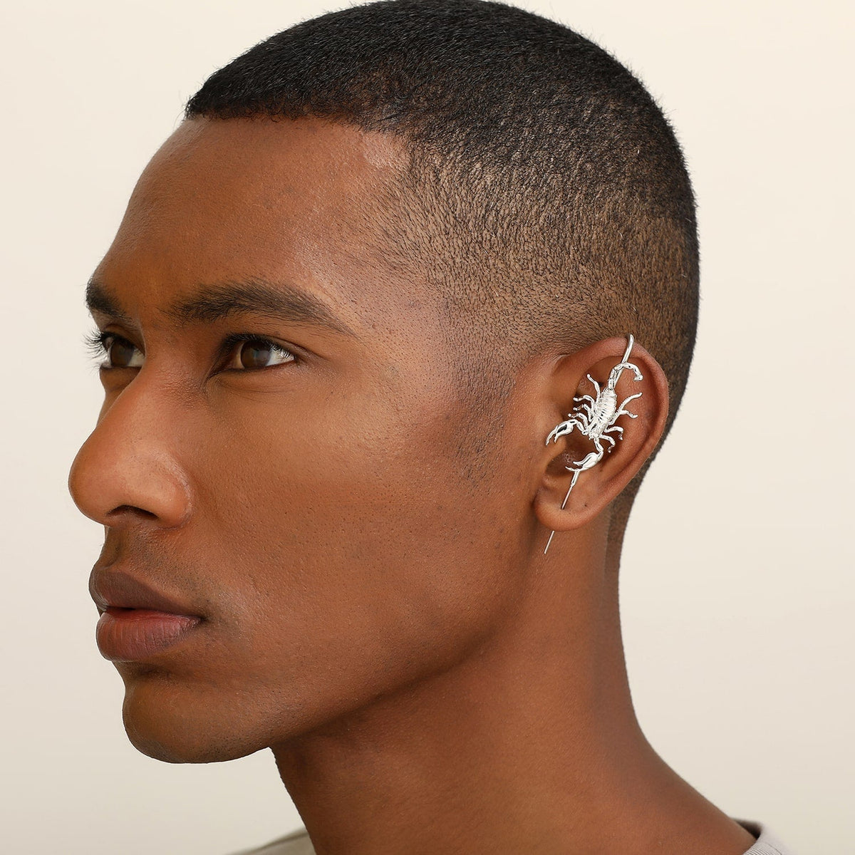 Fierce Scorpion ear cuff worn on the ear, profile view