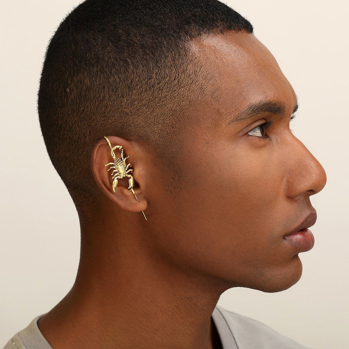 Fierce Scorpion ear cuff worn on the ear, profile view