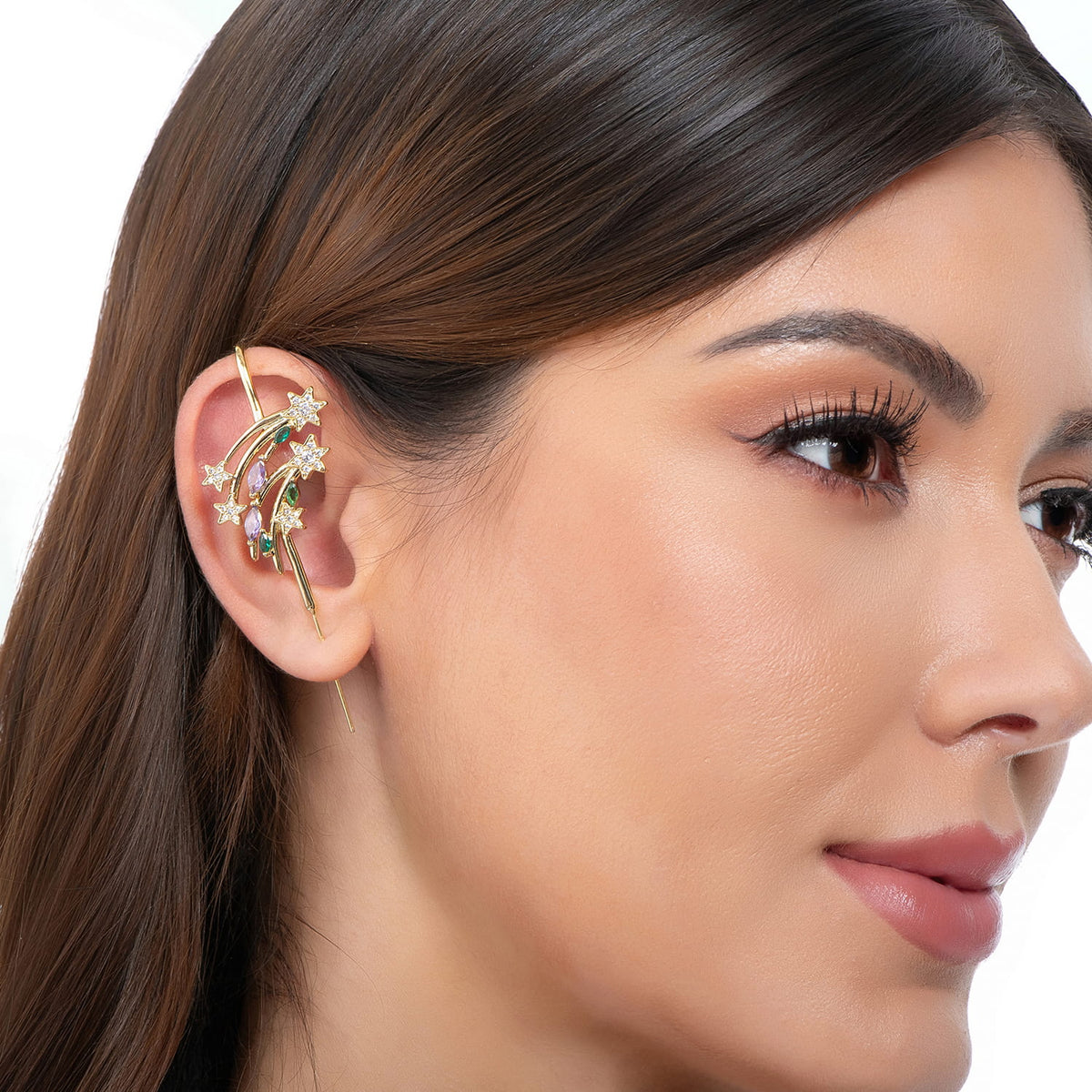 Shooting Star ear cuff in gold on a black ear form