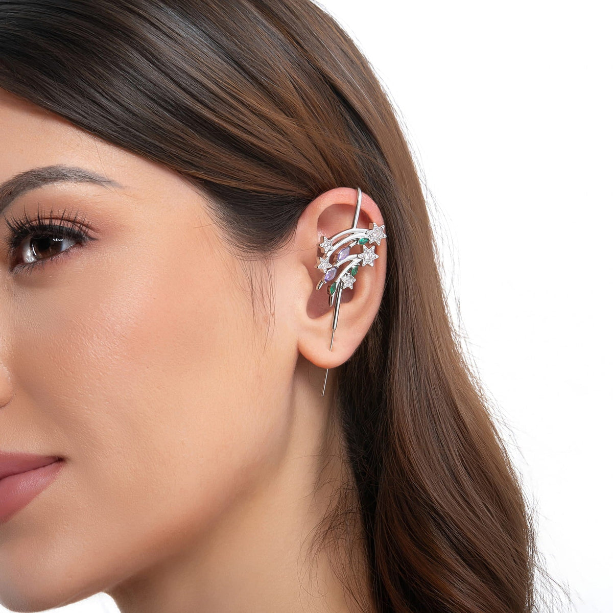Shooting Star ear cuff in silver on a black ear form