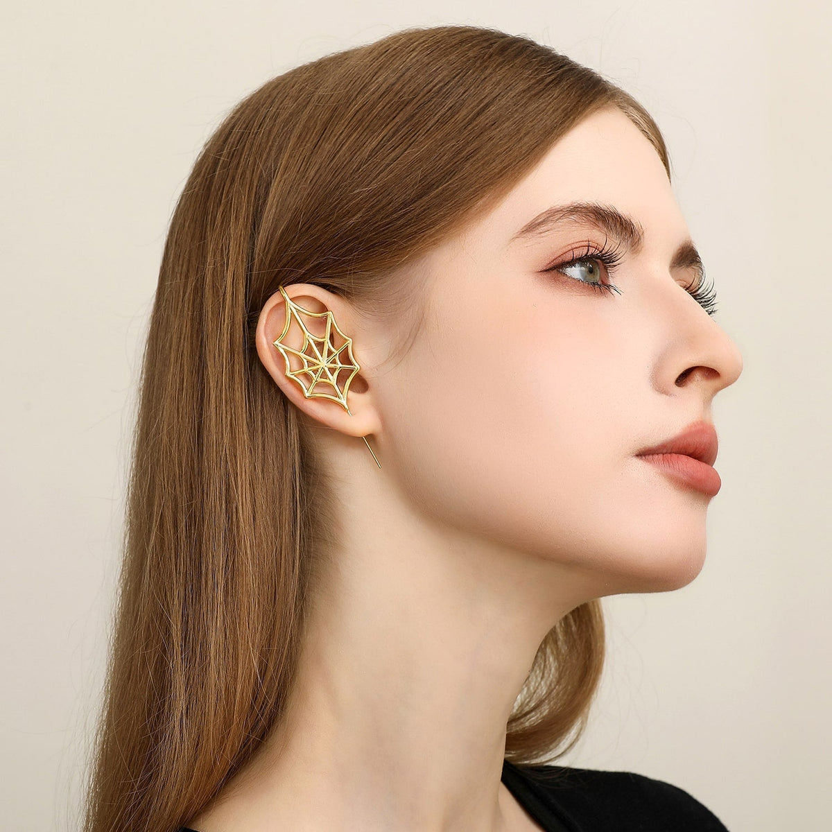 Silky Web ear cuff worn on the ear, profile view
