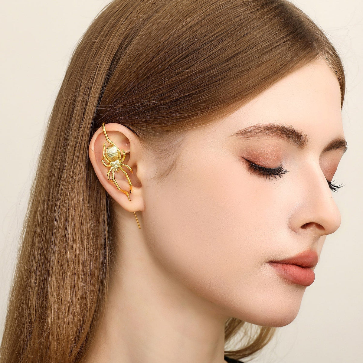 Arachnid Kiss ear cuff worn on the ear, profile view