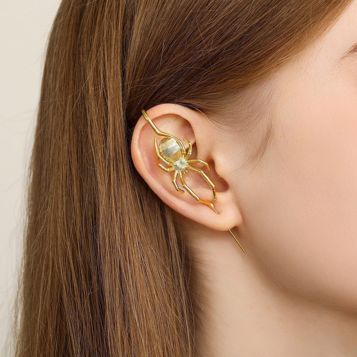 Arachnid Kiss ear cuff worn on the ear, profile view