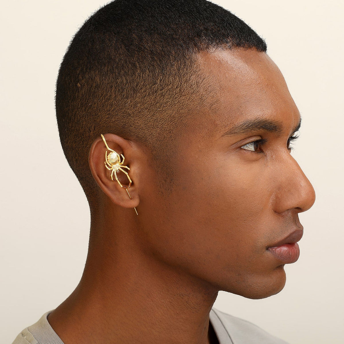 Arachnid Kiss ear cuff worn on the ear, profile view