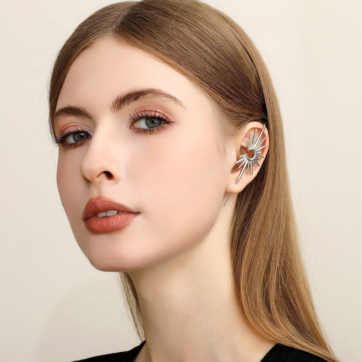 Sunray ear cuff worn on the ear, profile view