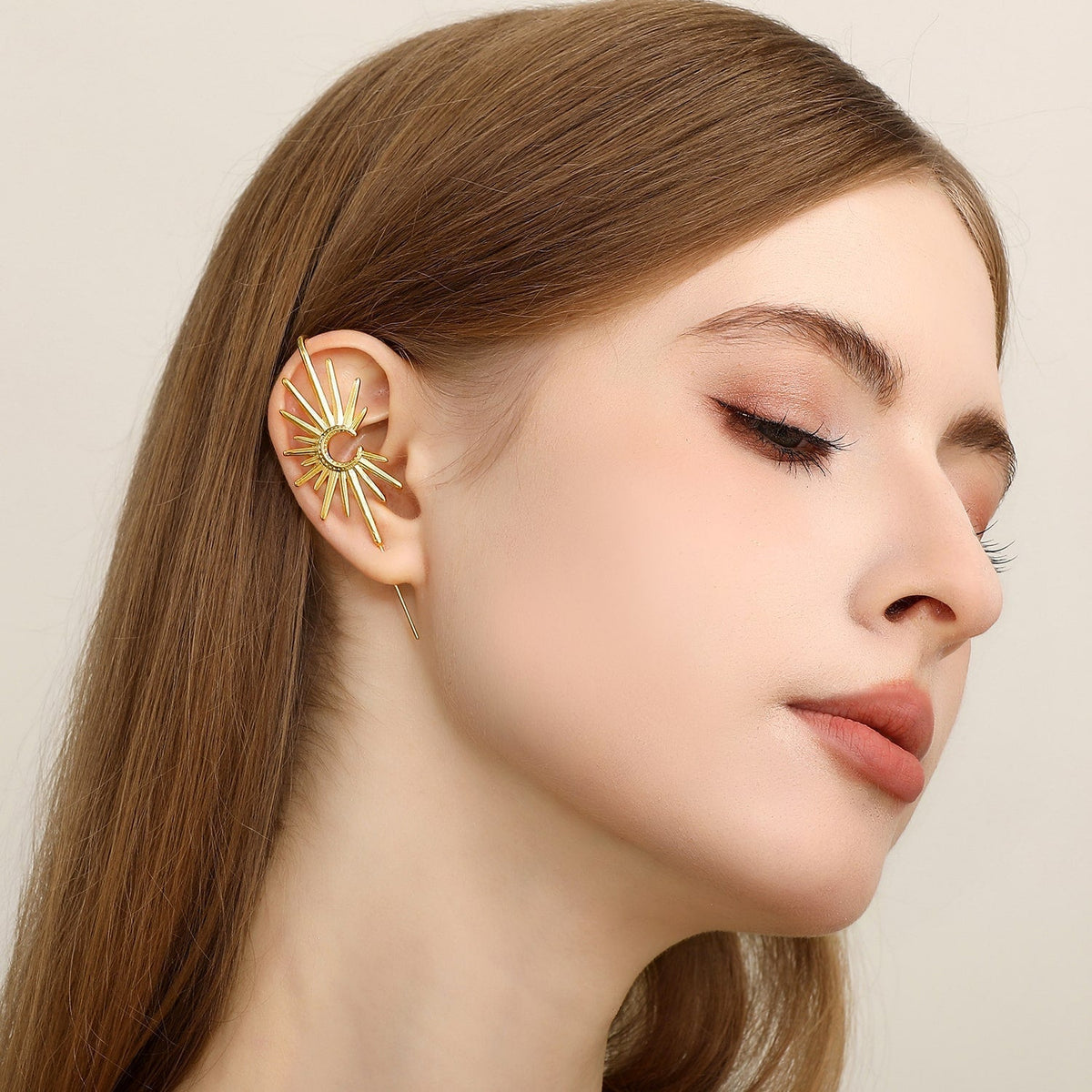 Sunray ear cuff worn on the ear, profile view
