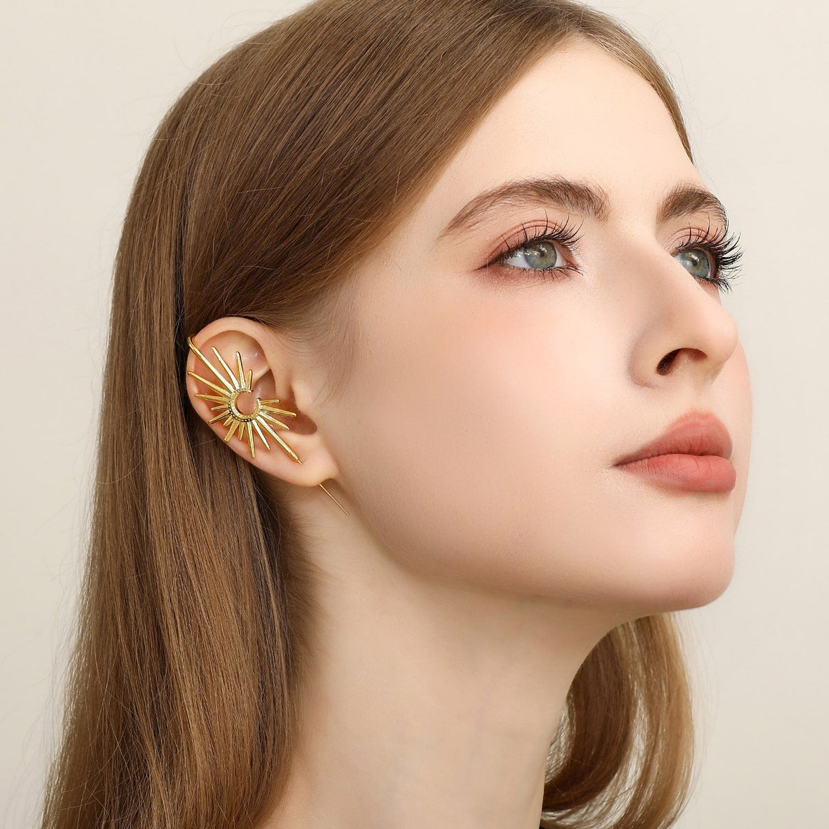 Sunray ear cuff worn on the ear, profile view