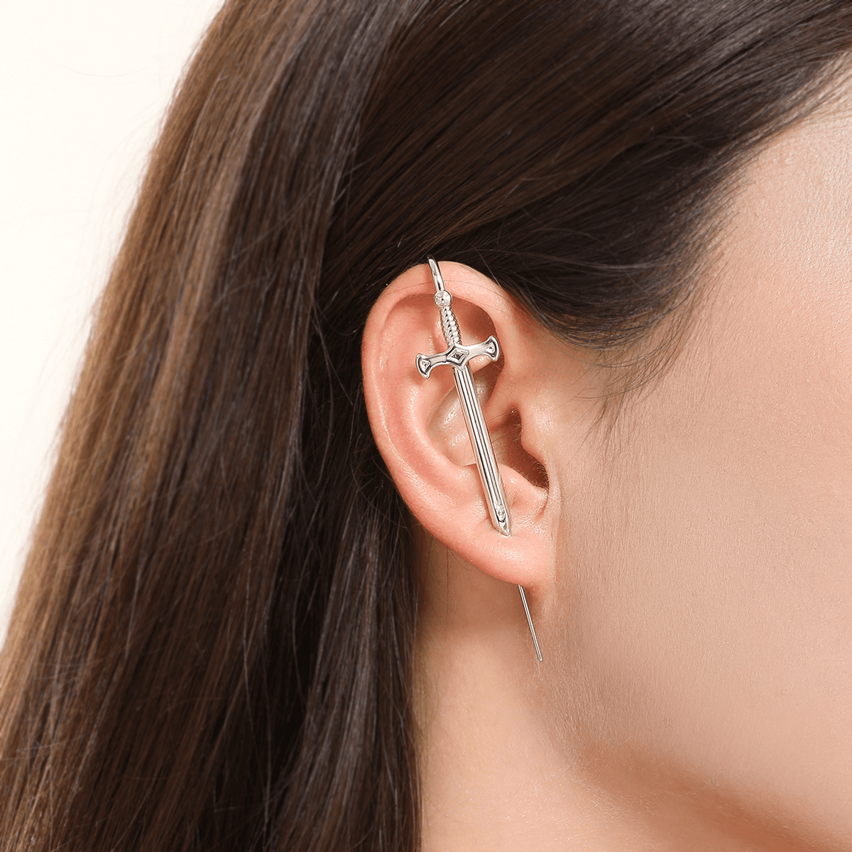 Titan's Edge ear cuff in silver worn on the ear, profile view