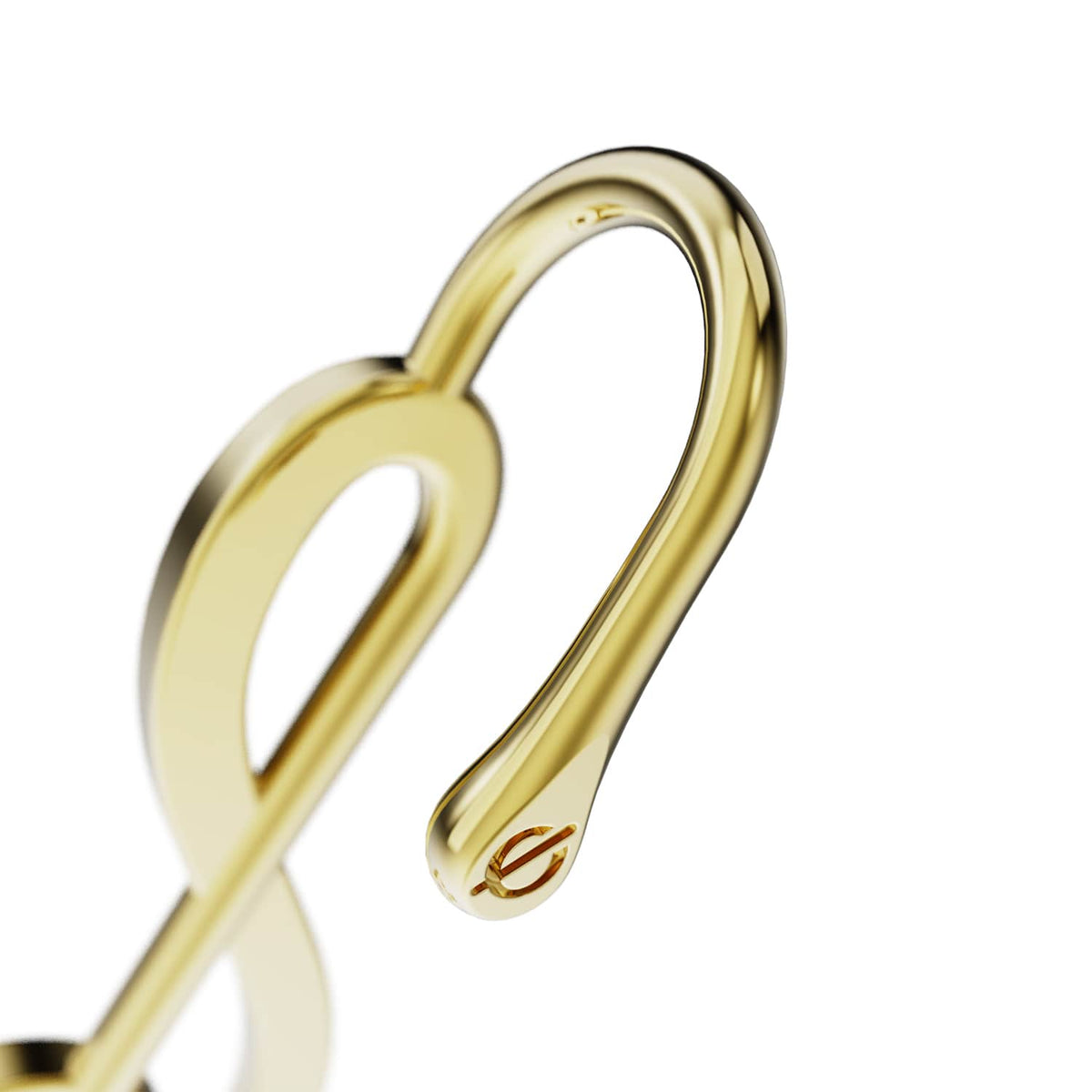 Treble Clef ear cuff in gold, the hook that sits over the ear