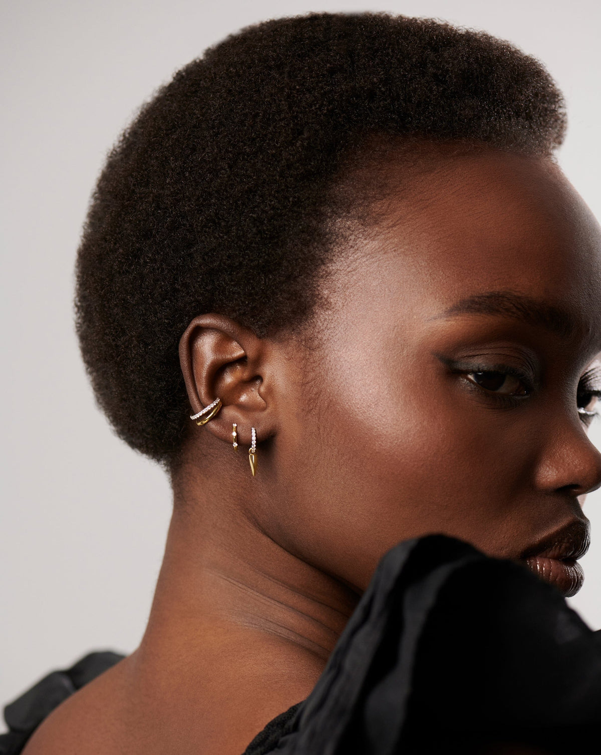 Avaline Solid Gold Diamond Studded Huggies